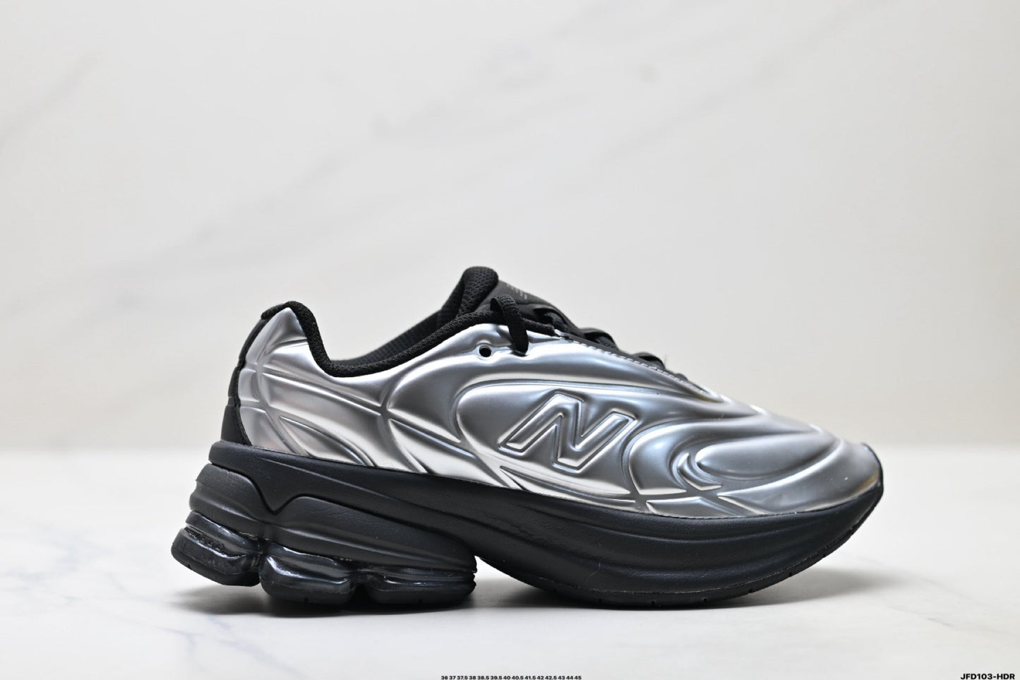 New Balance 9060 Sneakers – Silber Schwarz Metallic