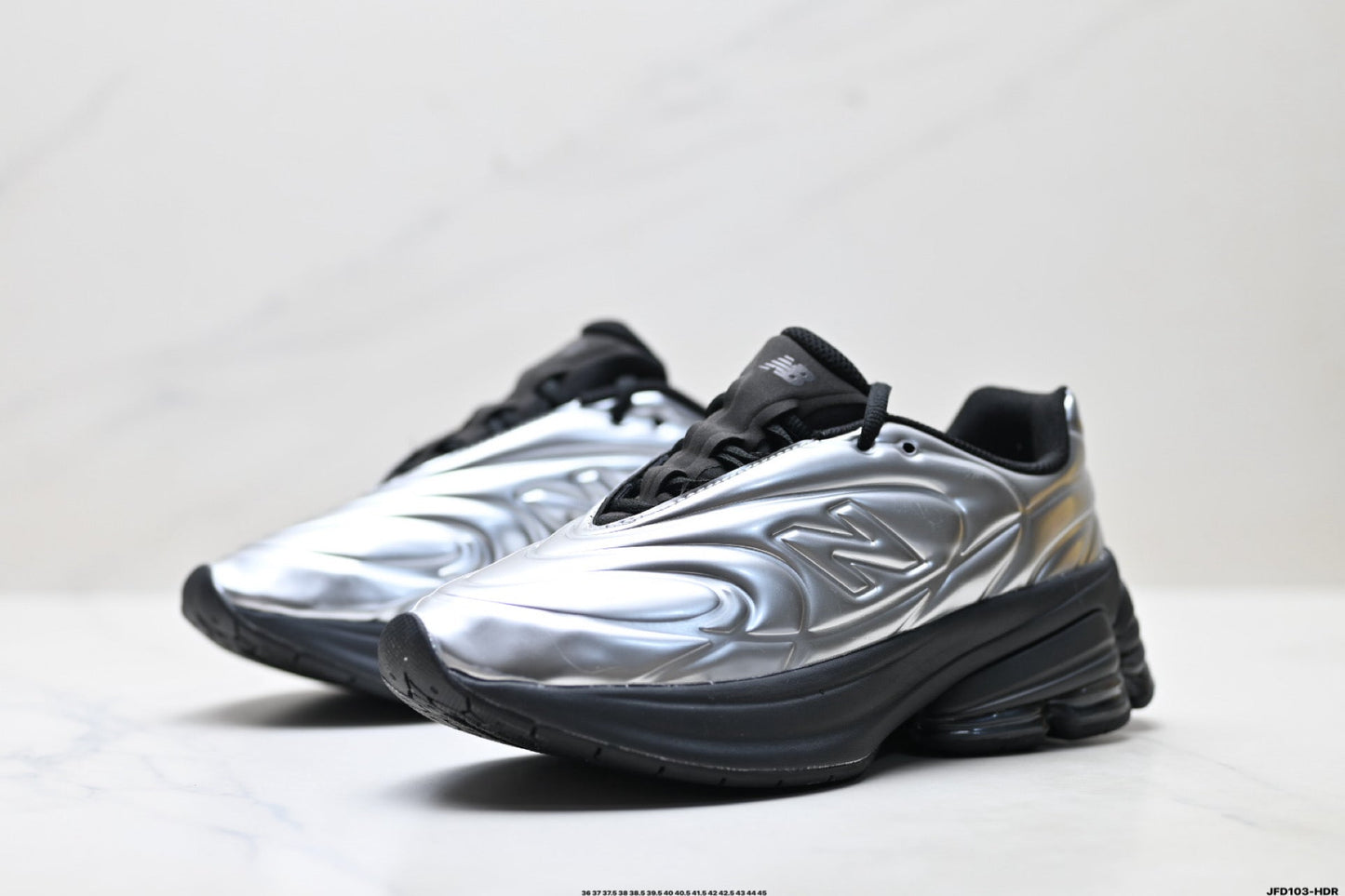 New Balance 9060 Sneakers – Silber Schwarz Metallic