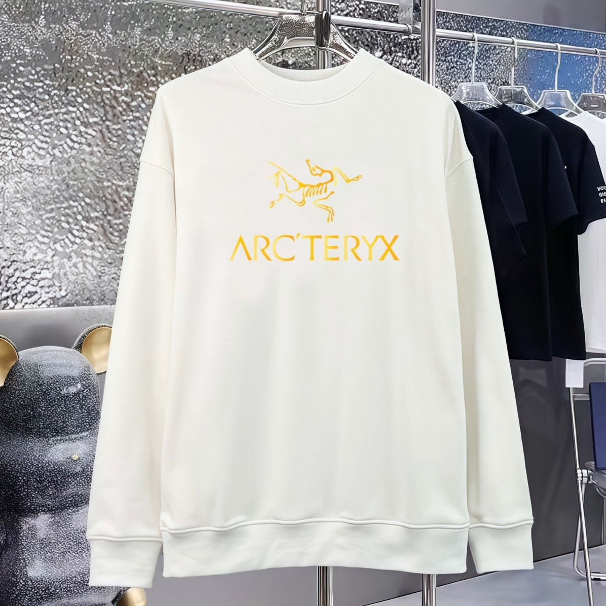 Off-white sweatshirt front with yellow graphic
